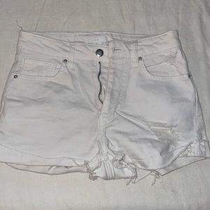 High waisted distressed white shorts